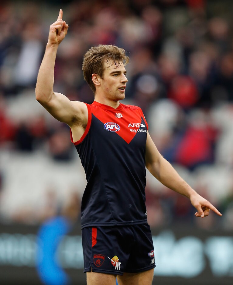 AFL 2016 Rd 20 - Melbourne v Hawthorn MELBOURNE, AUSTRALIA - AUGUST 06: Dom Tyson of the Demons celebrates a goal during the 2016 AFL Round 20 match between the Melbourne Demons and the Hawthorn Hawks at the Melbourne Cricket Ground on August 06, 2016 in Melbourne, Australia. (Photo by Michael Willson/AFL Media)